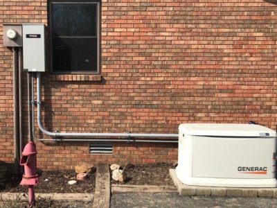 Central air conditioning installation with clean lines and equipment.