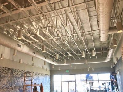 Custom galvanized steel HVAC ductwork sections and fittings.