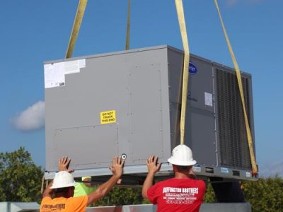 WaterFurnace geothermal heating and cooling system installed in a utility room.
